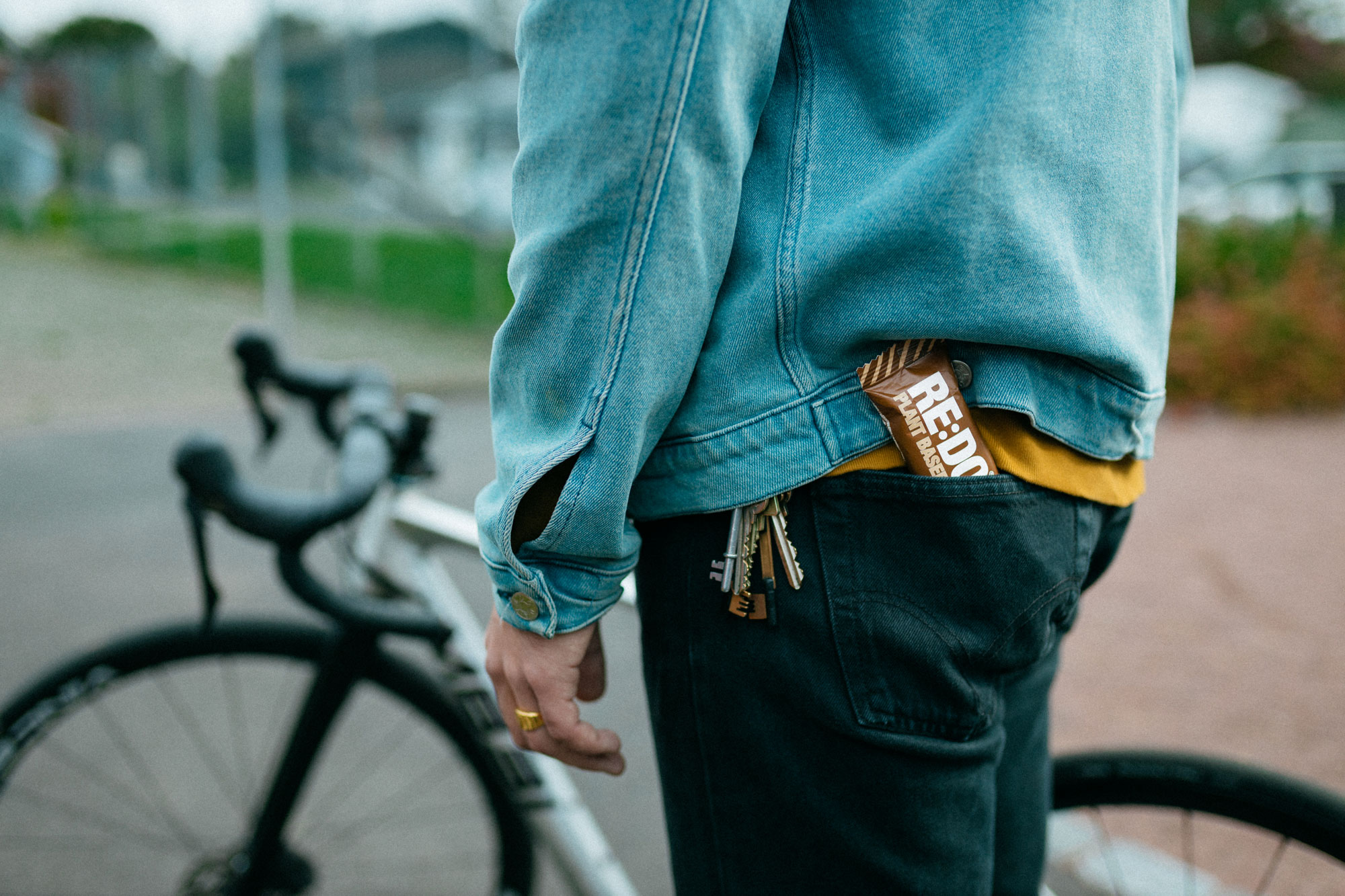 A person having a RE:DO bar in his pocket